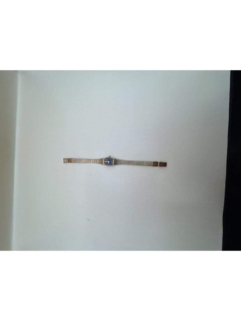 Bulova Women's Vintage Quartz Dress Watch with Blue Dial and Gold-Tone Bracelet